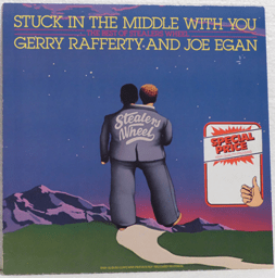 Show details for Gerry Rafferty And Joe Egan – Stuck In The Middle With You Picture of Gerry Rafferty And Joe Egan – Stuck In The Middle With You